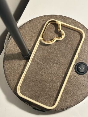 Clear Light Yellow Phone Case with Gold Camera Accent (iPhone 16)